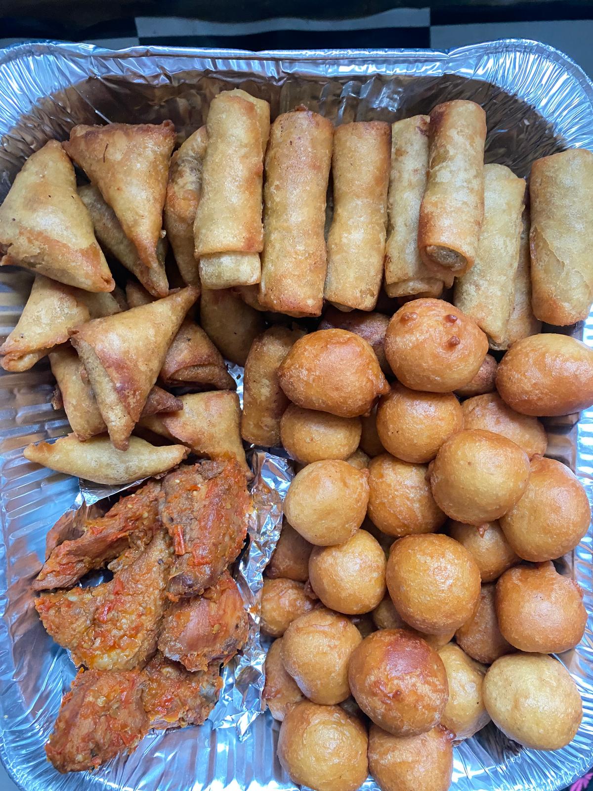 15 spring roll, 15 samosa, 30 puff puff and 5 chicken cut